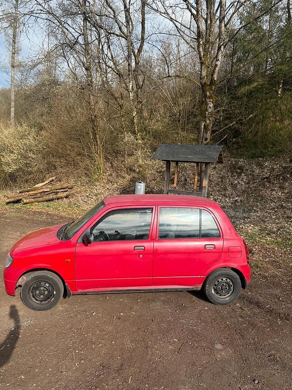 Gebraucht Daihatsu Cuore 56 PS (41 kW) 2002 Rot Kleinwagen