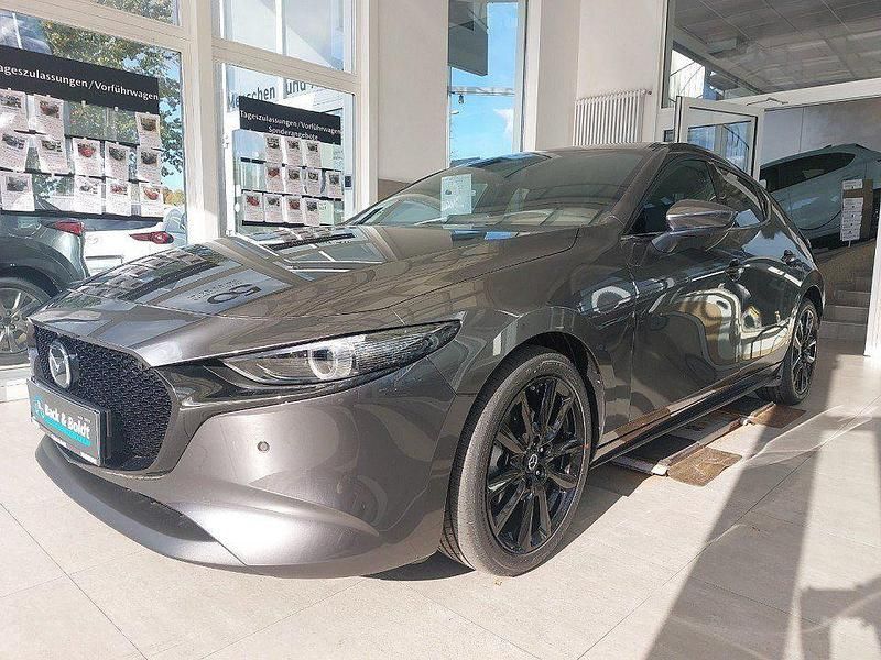 Grau Gebraucht 2024 Mazda 3 Exclusive-Line Kleinwagen | 29.950 € (Teuer) - Bild 1/4