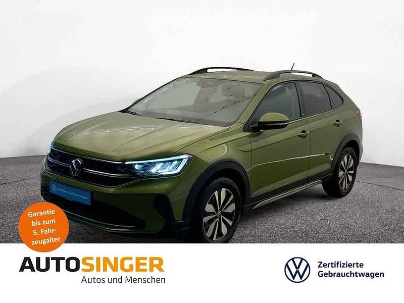 Visual green metallic Gebraucht 2024 VW Taigo Move SUV | 21.330 € (Guter Preis) - Bild 1/3