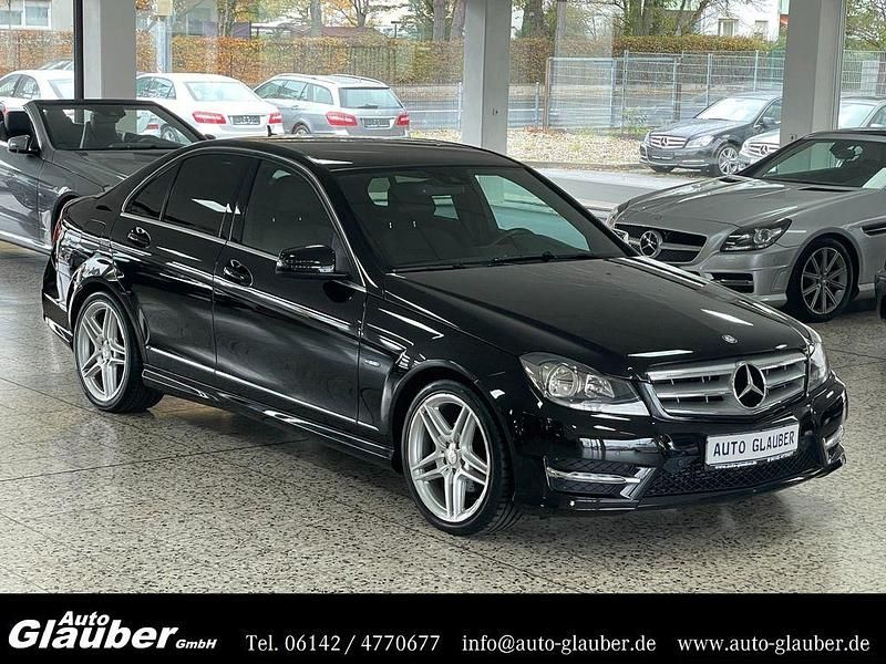 Schwarz Gebraucht 2011 Mercedes C180 AMG line Limousine | 11.950 € (Teuer) - Bild 1/4
