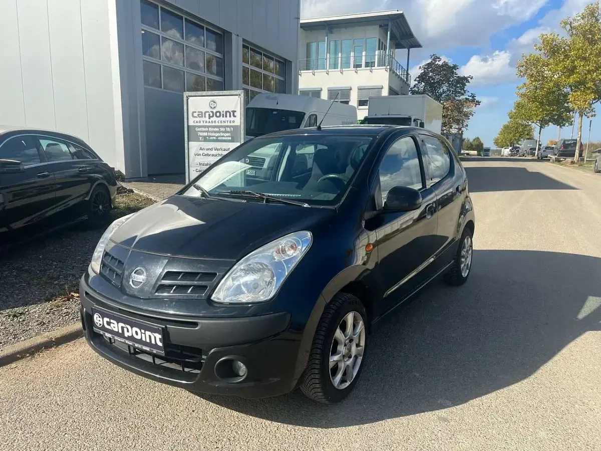Gebraucht Nissan Pixo 68 PS (50 kW) 2009 Blackmetallic Kleinwagen