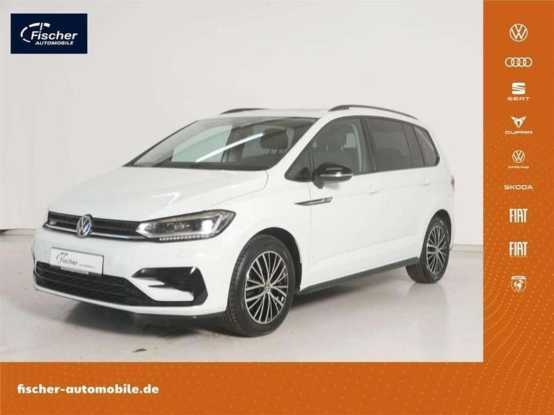 Pure white Gebraucht 2024 VW Touran Highline Van / Kleinbus | 38.480 € (Teuer) - Bild 1/4