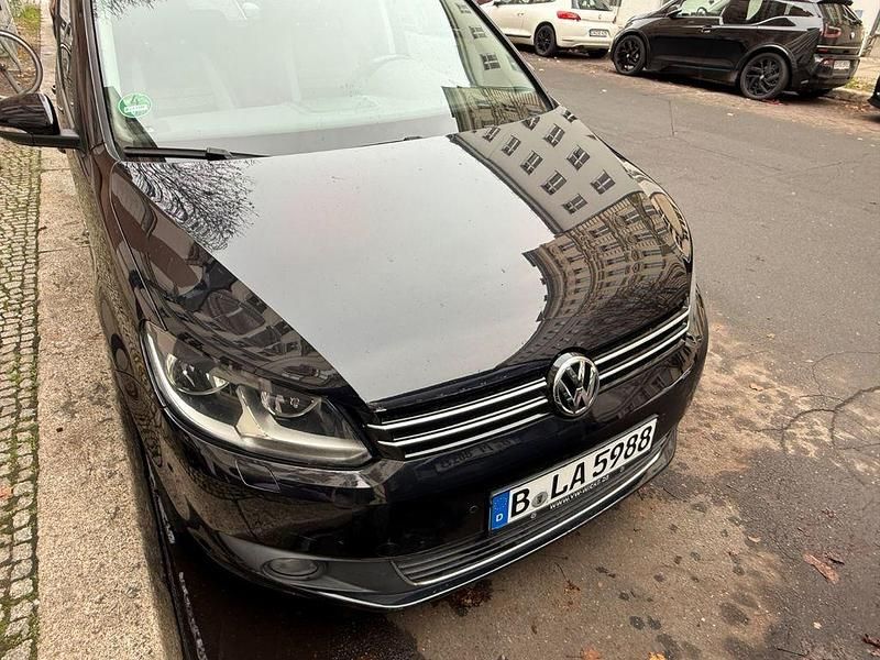 Schwarz Gebraucht 2013 VW Touran Life Van / Kleinbus | 5.800 € - Bild 1/4