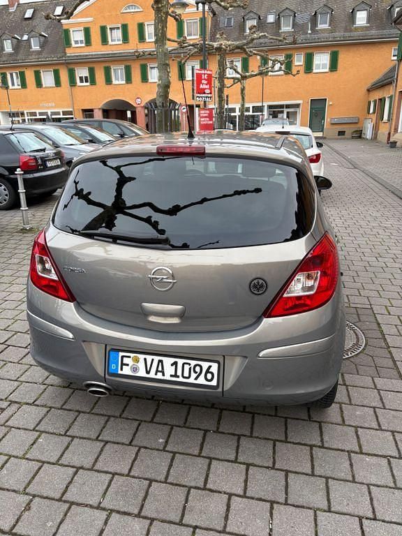 Gebraucht Opel Corsa Selection 87 PS (63 kW) 2011 Braun Kleinwagen