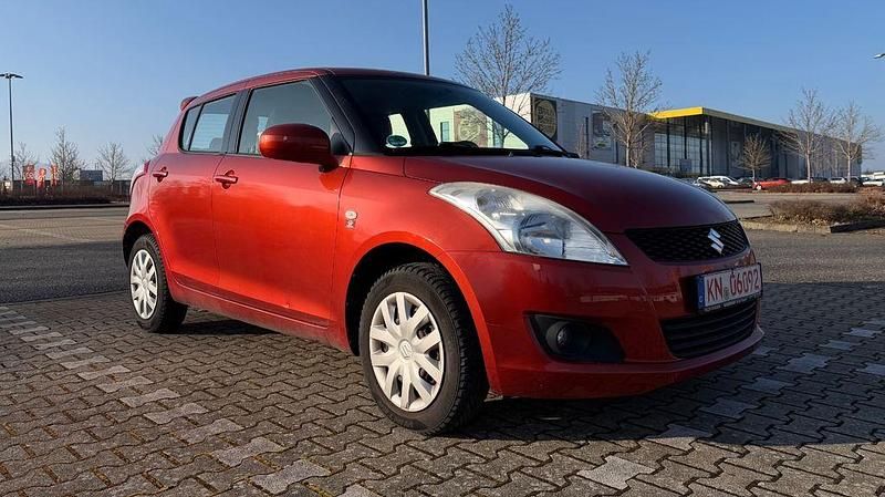 Gebraucht Suzuki Swift Club 94 PS (69 kW) 2011 Orange Kleinwagen