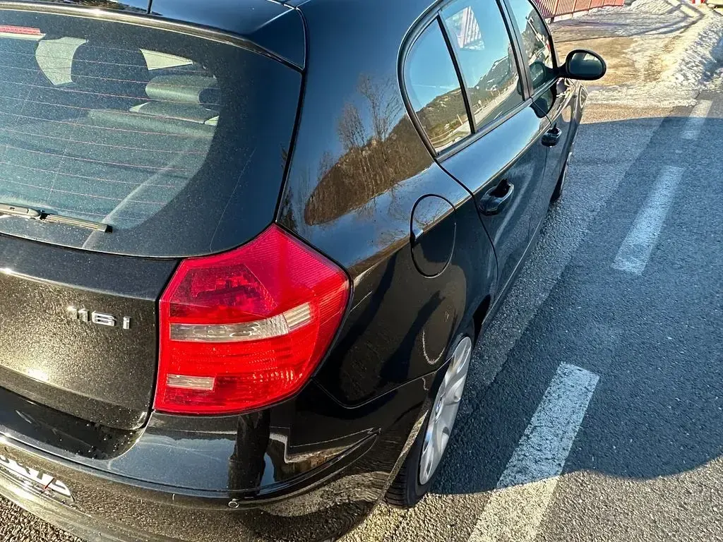 Gebraucht BMW 116 122 PS (89 kW) 2009 Schwarz Kleinwagen