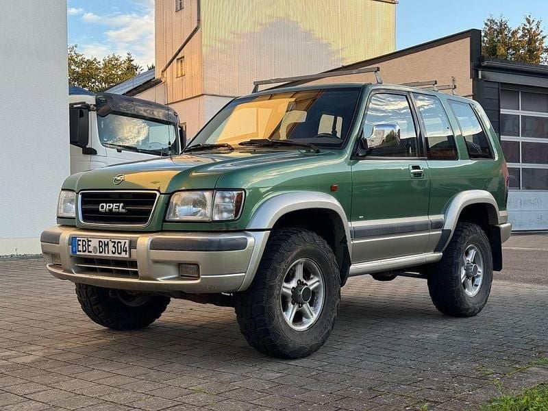 Grün Gebraucht 1999 Opel Monterey SUV | 8.000 € - Bild 1/4