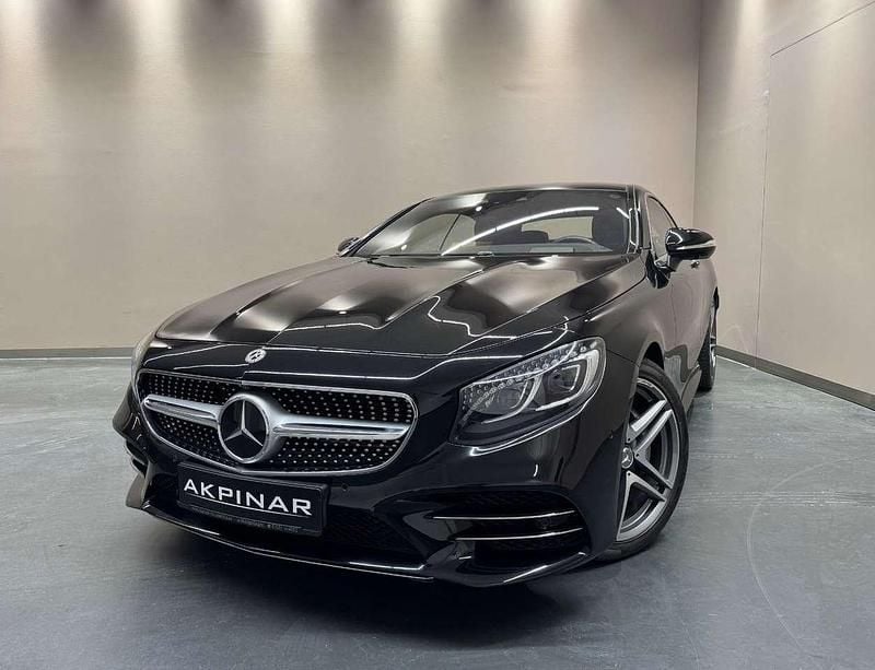 Obsidianschwarz Gebraucht 2018 Mercedes 560 AMG line Coupé | 78.700 € - Bild 1/4