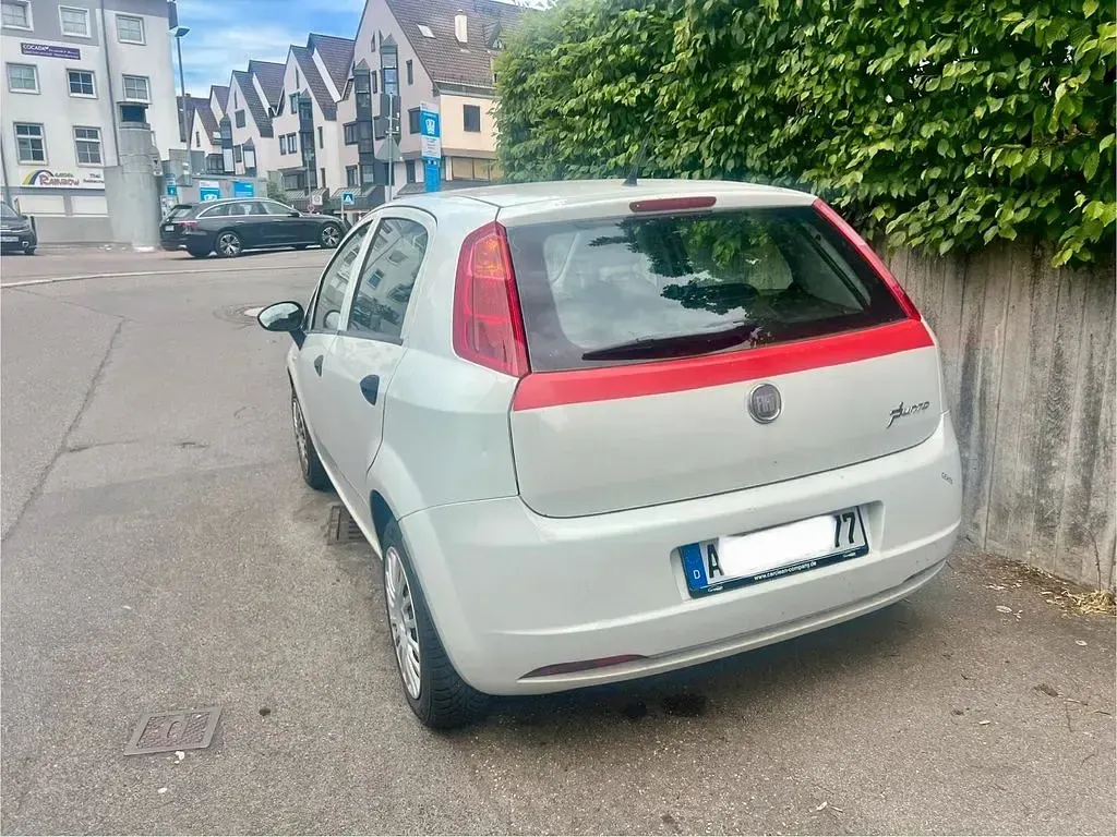 Gebraucht Fiat Grande Punto 69 PS (50 kW) 2011 Weiß Kleinwagen