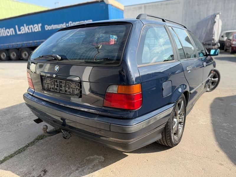 Gebraucht BMW 320 150 PS (110 kW) 1997 Blau Kombi