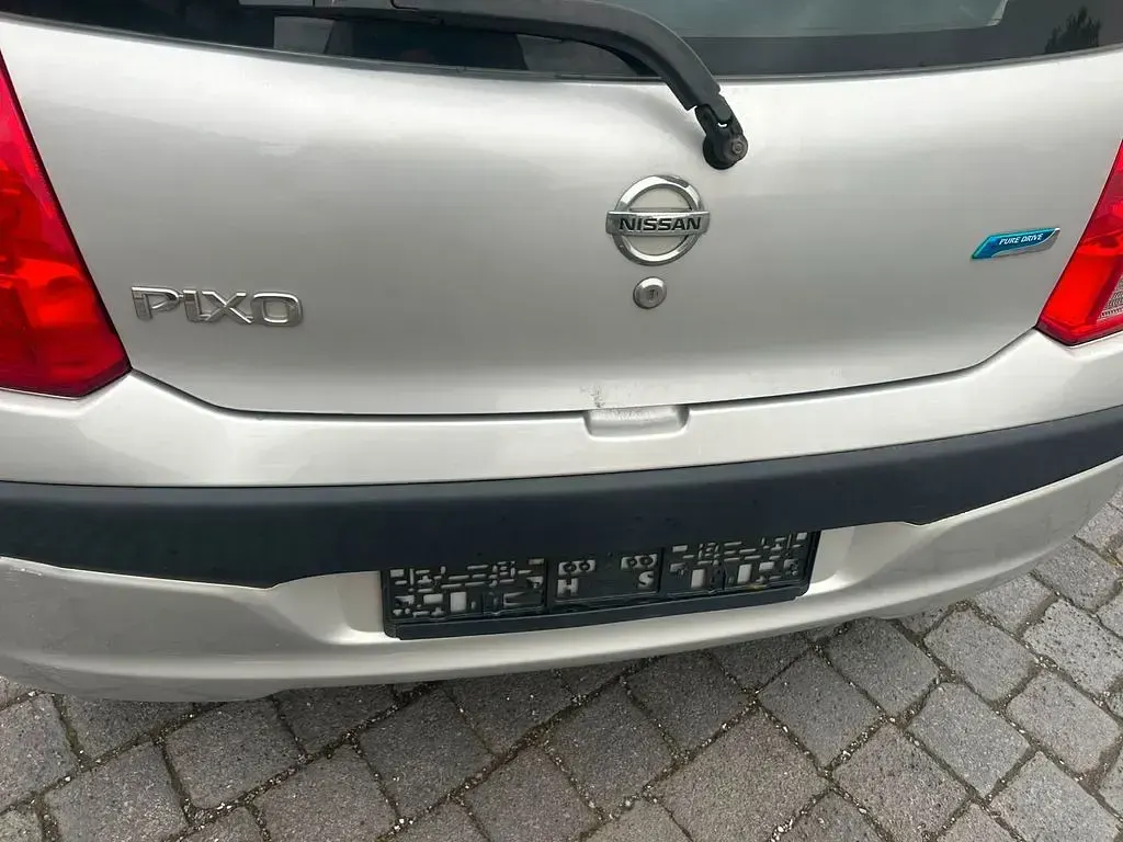 Gebraucht Nissan Pixo Acenta 68 PS (50 kW) 2010 Silber Kleinwagen