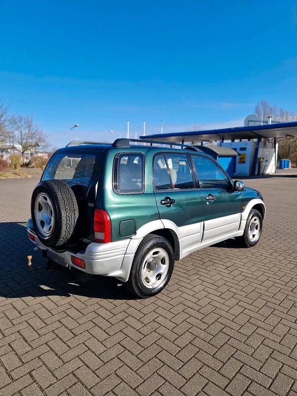 Gebraucht Suzuki Grand Vitara 144 PS (105 kW) 1999 Grün SUV