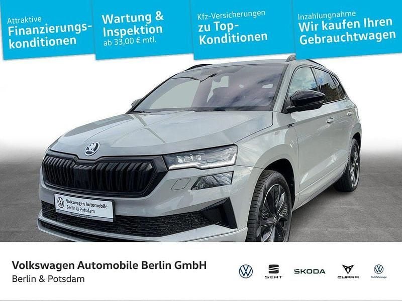 Grau Gebraucht 2022 Skoda Karoq SportLine SUV | 25.870 € (Superpreis) - Bild 1/4