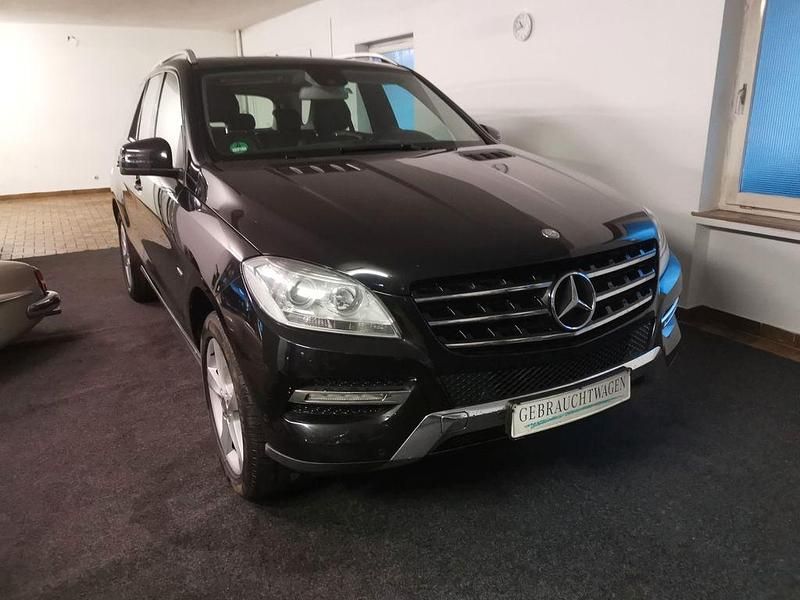 Schwarz Gebraucht 2011 Mercedes ML250 SUV | 11.900 € (Fairer Preis) - Bild 1/4