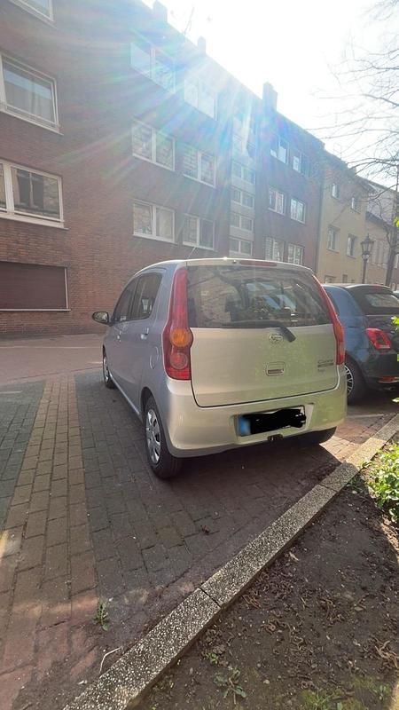 Gebraucht Daihatsu Cuore 69 PS (50 kW) 2009 Silber Kleinwagen