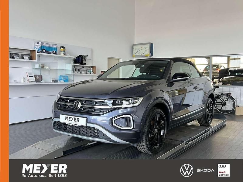 Gebraucht VW T-Roc Cabriolet Style 150 PS (110 kW) 2024 Rauchgrau metallic / schwarz Cabrio