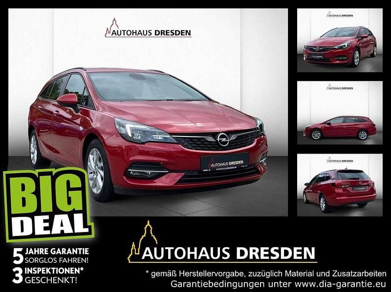 Chili rot Gebraucht 2021 Opel Astra Kombi | 14.450 € (Superpreis) - Bild 1/4