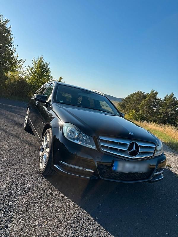 Schwarz Gebraucht 2012 Mercedes C180 Kombi | 9.000 € - Bild 1/4