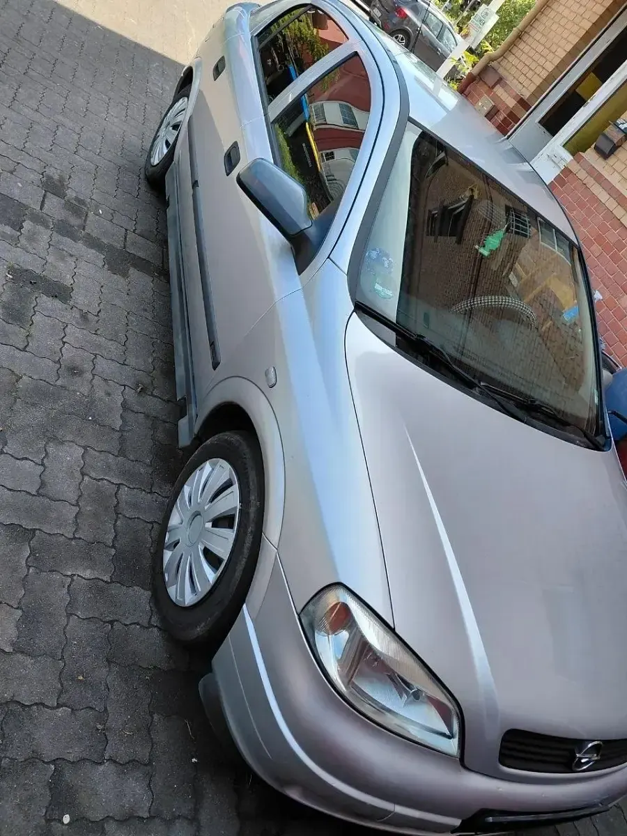 Używany Opel Astra 120 KM (88 kW) 2003 Szary Sedan/Limuzyna