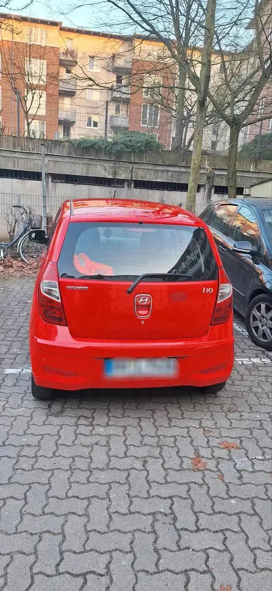 Gebraucht Hyundai i10 69 PS (50 kW) 2012 Rot Kleinwagen