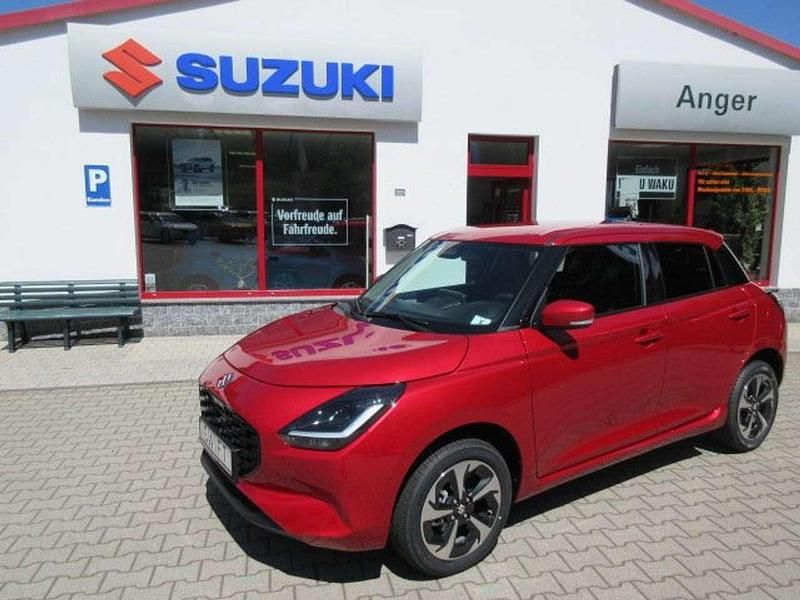 Burningredpearlmetallic Neu 2025 Suzuki Swift Comfort+ Kleinwagen | 22.590 € - Bild 1/4