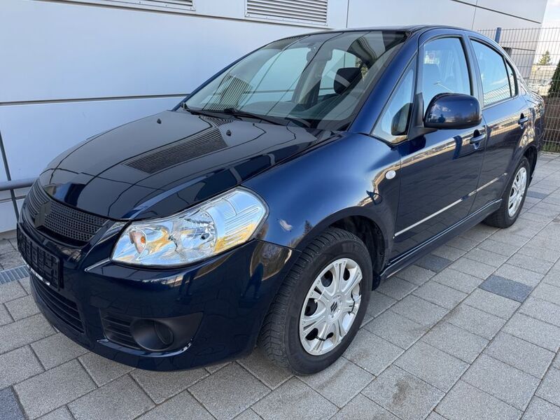 Blau Gebraucht 2008 Suzuki SX4 Comfort Limousine | 900 € (Superpreis) - Bild 1/4