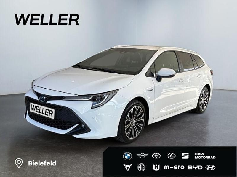 Weiss Gebraucht 2021 Toyota Corolla Team Kombi | 26.880 € (Etwas zu teuer) - Bild 1/3