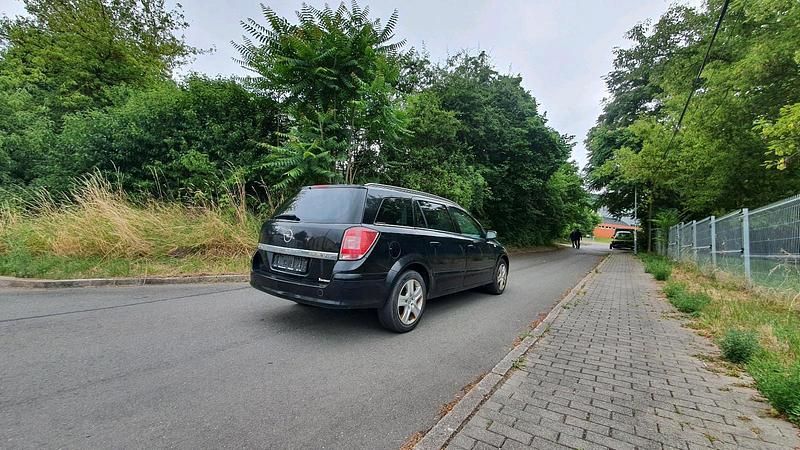 Second-hand Opel Astra 125 CP (91 kW) 2008 Negru Break