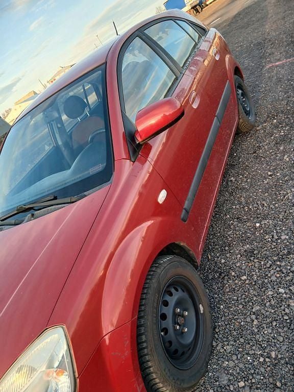 Gebraucht Kia Rio EX 97 PS (71 kW) 2009 Rot Limousine