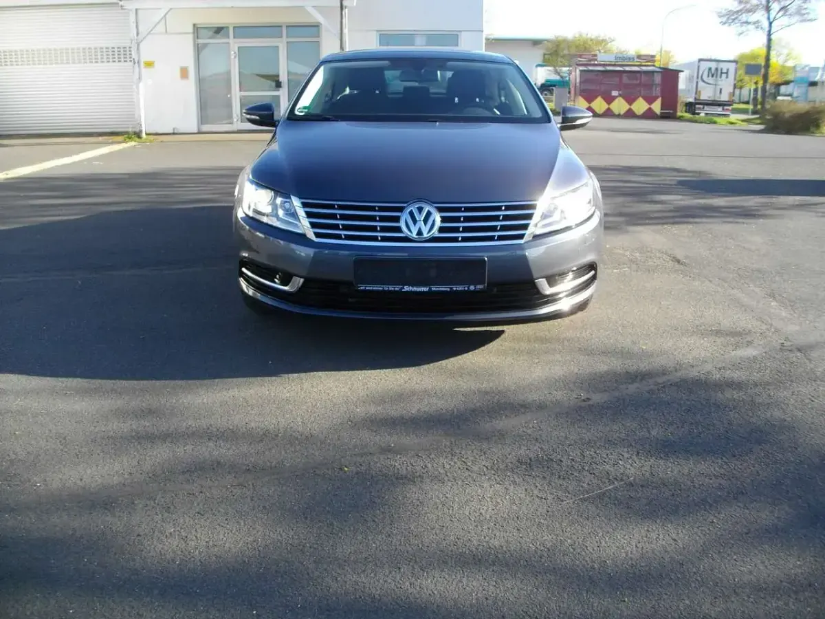 Gebraucht VW Passat 140 PS (102 kW) 2014 Islandgrau perleffekt Coupé