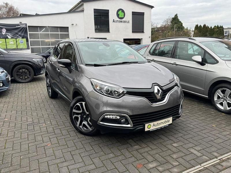 Grau Gebraucht 2013 Renault Captur Intens SUV | 10.499 € (Fairer Preis) - Bild 1/4