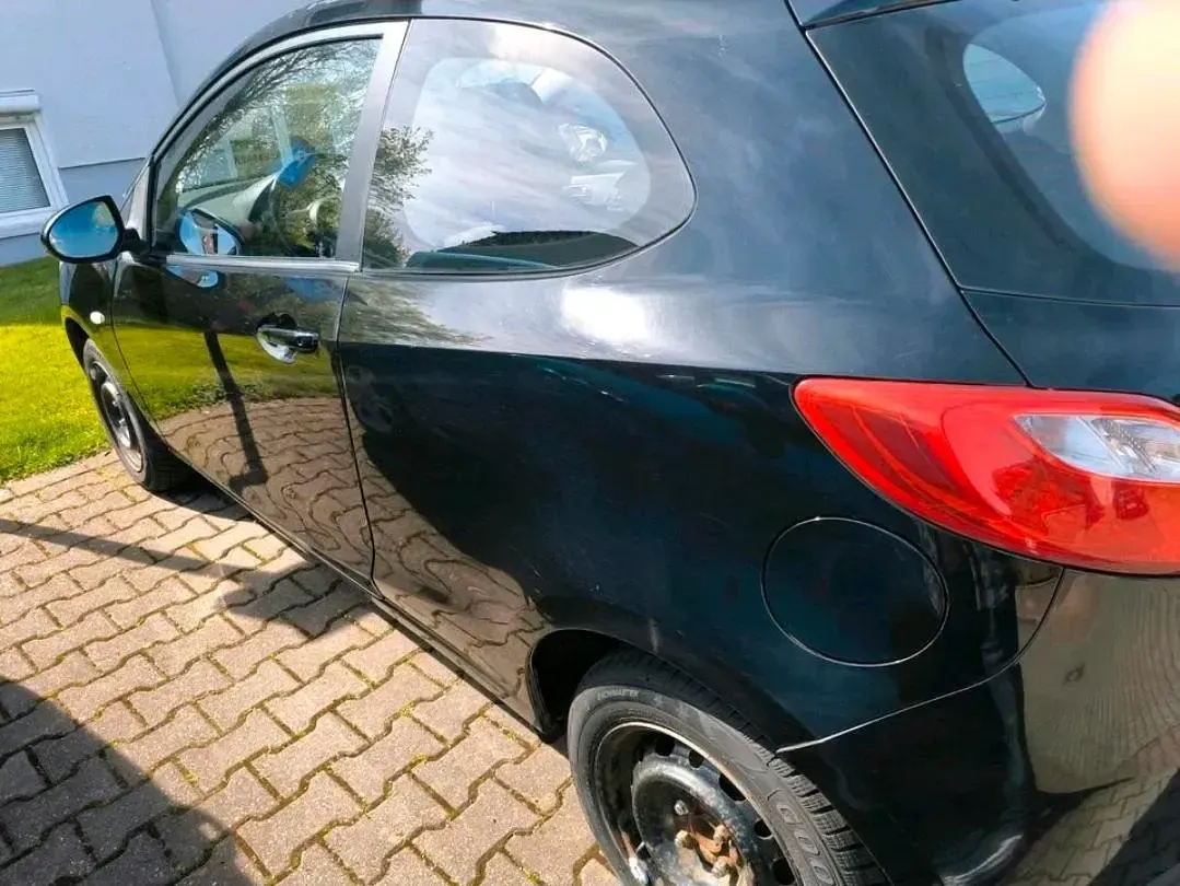 Gebraucht Mazda 2 68 PS (50 kW) 2010 Schwarz Kleinwagen