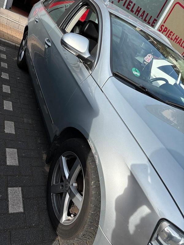 Second-hand VW Passat 150 CP (110 kW) 2010 Argintiu Break