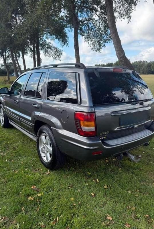 Grau Gebraucht 2002 Jeep Grand Cherokee Overland SUV | 8.500 € (Fairer Preis) - Bild 1/4