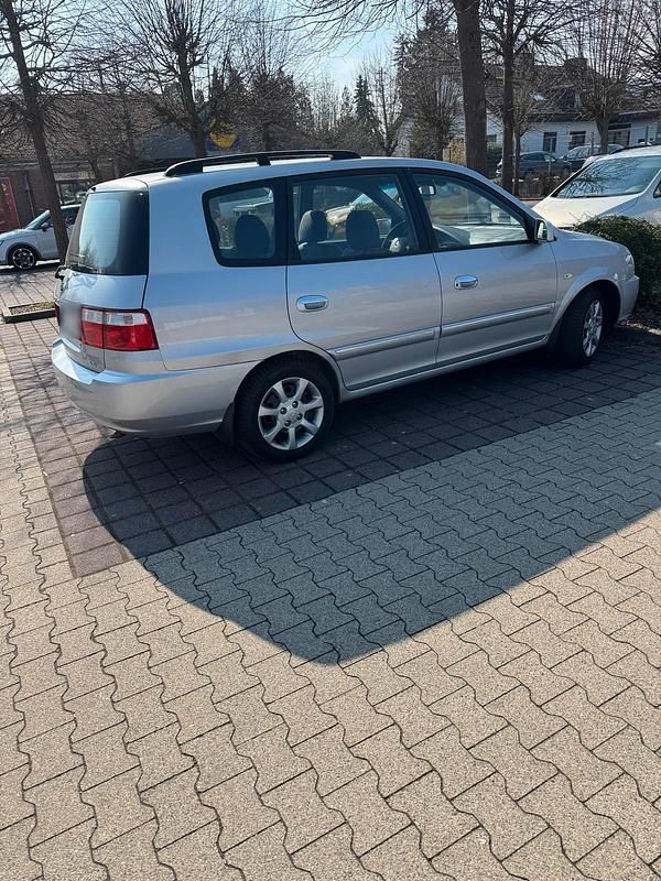 Gebraucht Kia Carens 140 PS (102 kW) 2006 Silber Van / Kleinbus