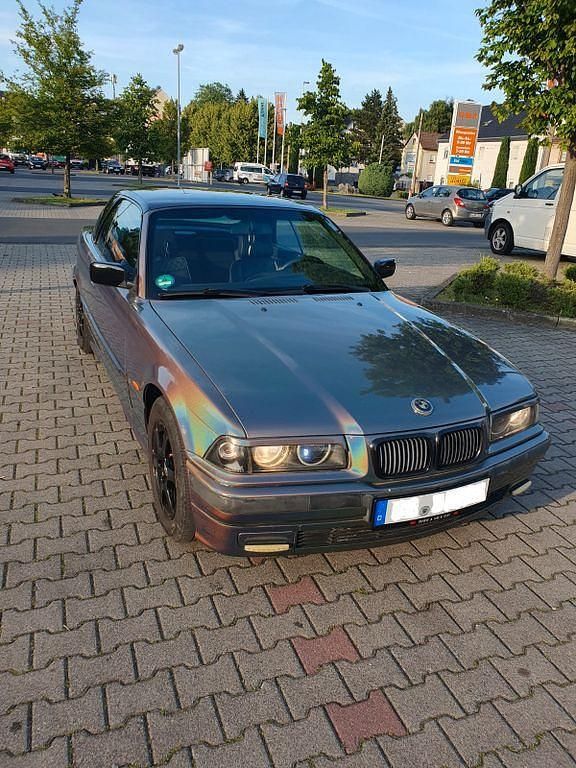 Gebraucht BMW 318 Cabriolet Basis 116 PS (85 kW) 1997 Schwarz Cabrio