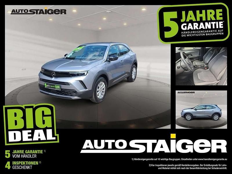 Kontrast grau/quarz silber Gebraucht 2023 Opel Mokka SUV | 15.999 € (Guter Preis) - Bild 1/4