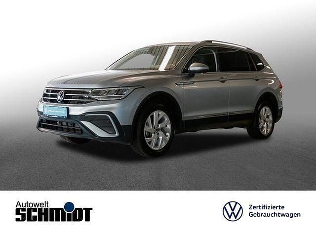 Pyritsilber metallic Gebraucht 2024 VW Tiguan Allspace Life SUV | 31.998 € (Superpreis) - Bild 1/4
