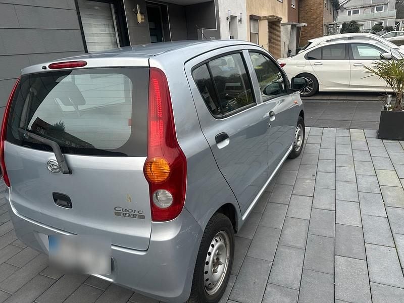 Gebraucht Daihatsu Cuore 74 PS (54 kW) 2008 Silber Kleinwagen