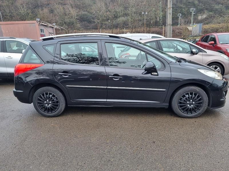 Gebraucht Peugeot 207 96 PS (70 kW) 2011 Schwarz Kombi