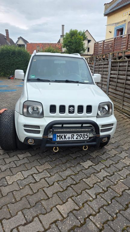 Weiß Gebraucht 2007 Suzuki Jimny SUV | 7.654 € (Fairer Preis) - Bild 1/4