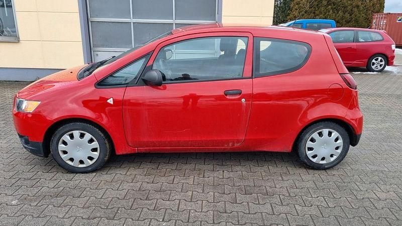 Gebraucht Mitsubishi Colt Basis 75 PS (55 kW) 2009 Rot Kleinwagen