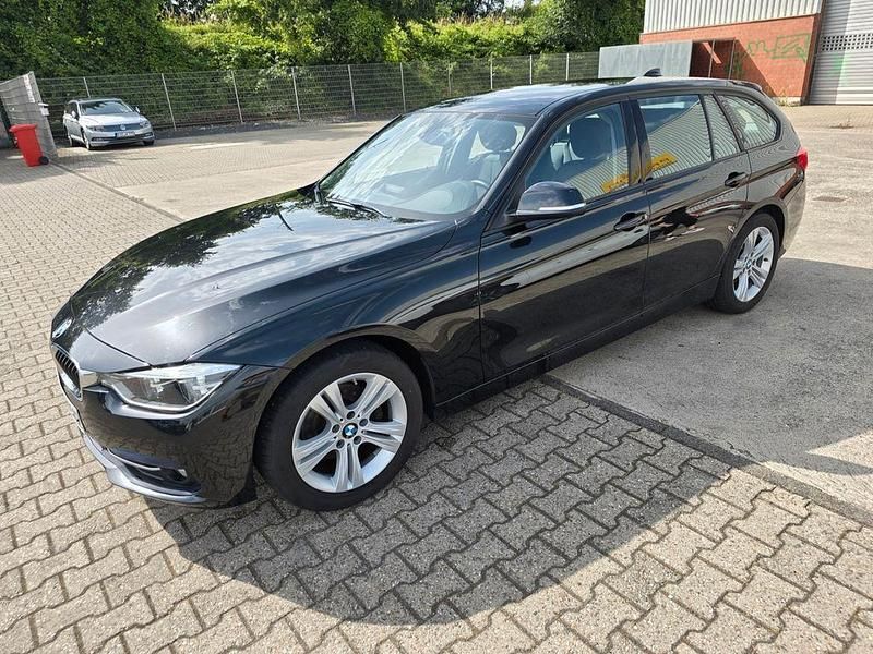 Schwarz Gebraucht 2019 BMW 320 Sport Line Kombi | 20.300 € (Superpreis) - Bild 1/4