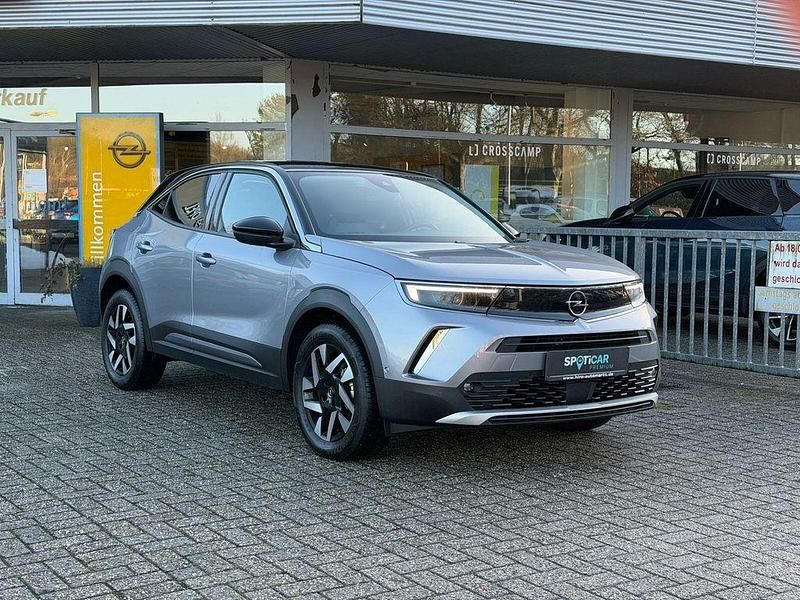 Gebraucht Opel Mokka-e Elegance 100 kW (136 PS) 2022 Quarz silber SUV