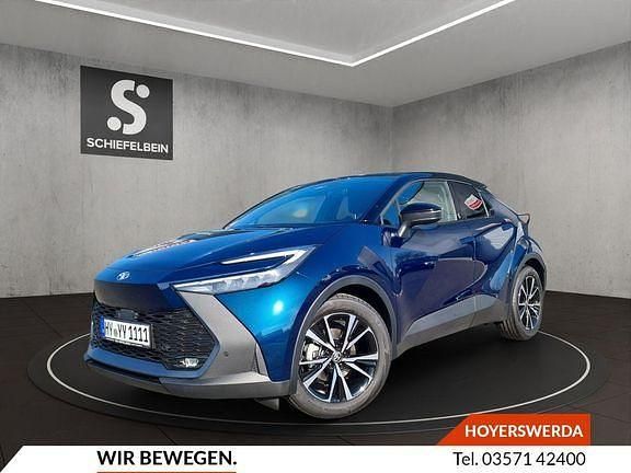 Dark teal mica metallic / black Gebraucht 2024 Toyota C-HR Team SUV | 27.900 € (Superpreis) - Bild 1/4