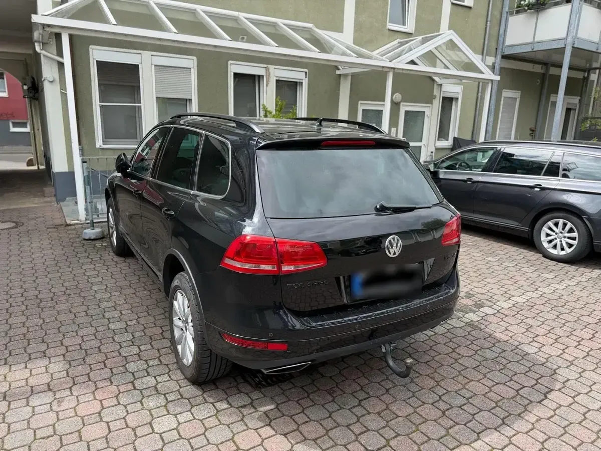Używany VW Touareg 340 KM (250 kW) 2012 Czarny SUV