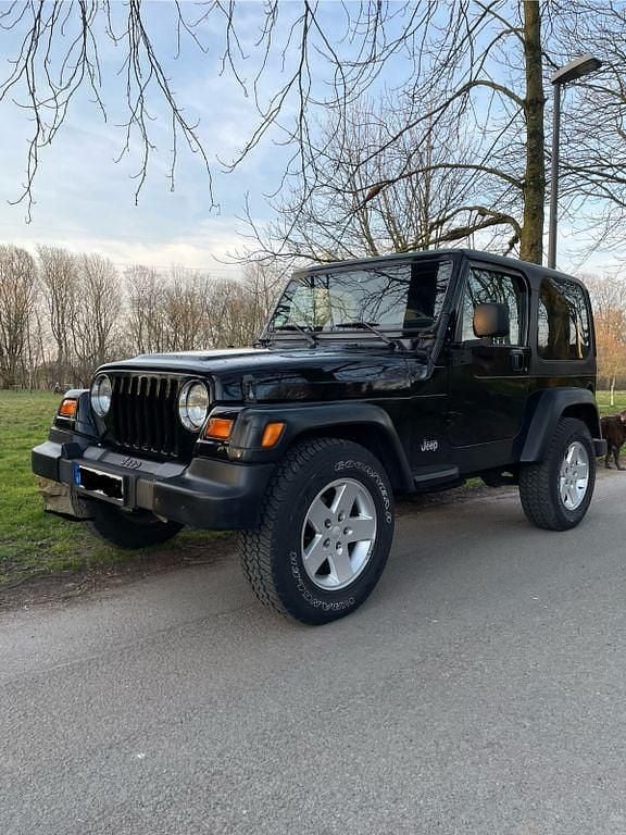 Schwarz Gebraucht 1996 Jeep Wrangler Sport SUV | 6.800 € (Fairer Preis) - Bild 1/4