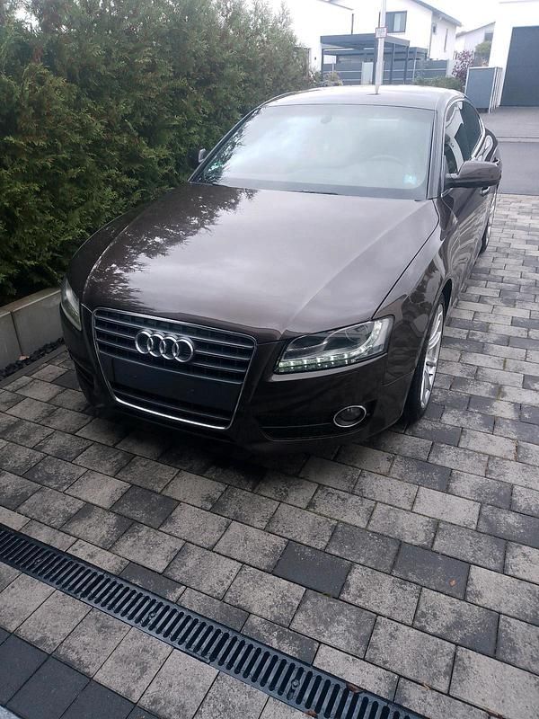 Braun Gebraucht 2011 Audi A5 Coupé | 5.499 € (Superpreis) - Bild 1/4