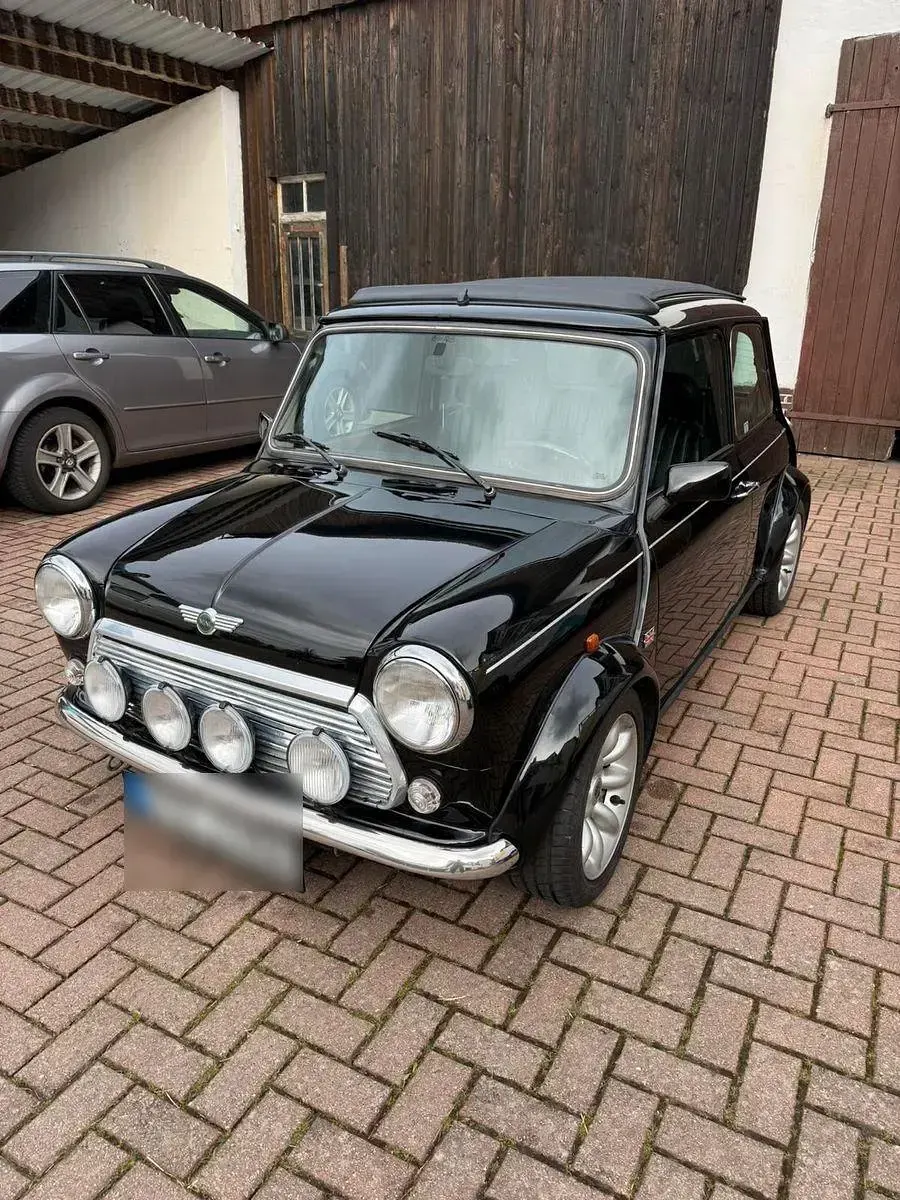 Gebraucht Mini Cooper 63 PS (46 kW) 1998 Schwarz Kleinwagen