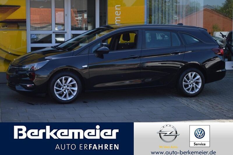Onyx schwarz (metallic) Gebraucht 2021 Opel Astra Business Kombi | 13.890 € (Fairer Preis) - Bild 1/4